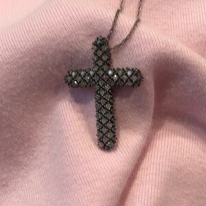Elegant Diamond Cross Necklace in Sterling Silver.